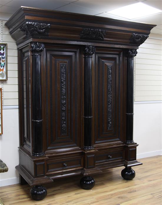 A large Dutch or Flemish oak two door wardrobe or kast, W.6ft 5in. H.7ft 7.5in.